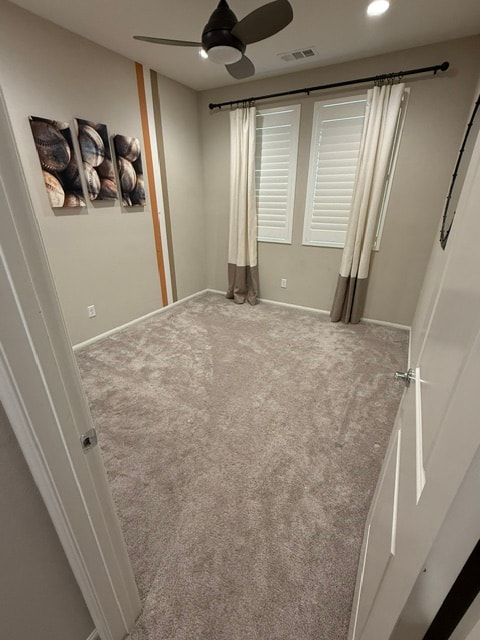 Bedroom with carpet before flooring replacement